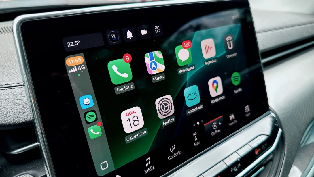 Car infotainment screen running connected apps, used in automotive software testing tools.